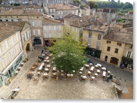 Square in St.Emilion Gironde, Aquitaine, France <br />with tables ready for lunch